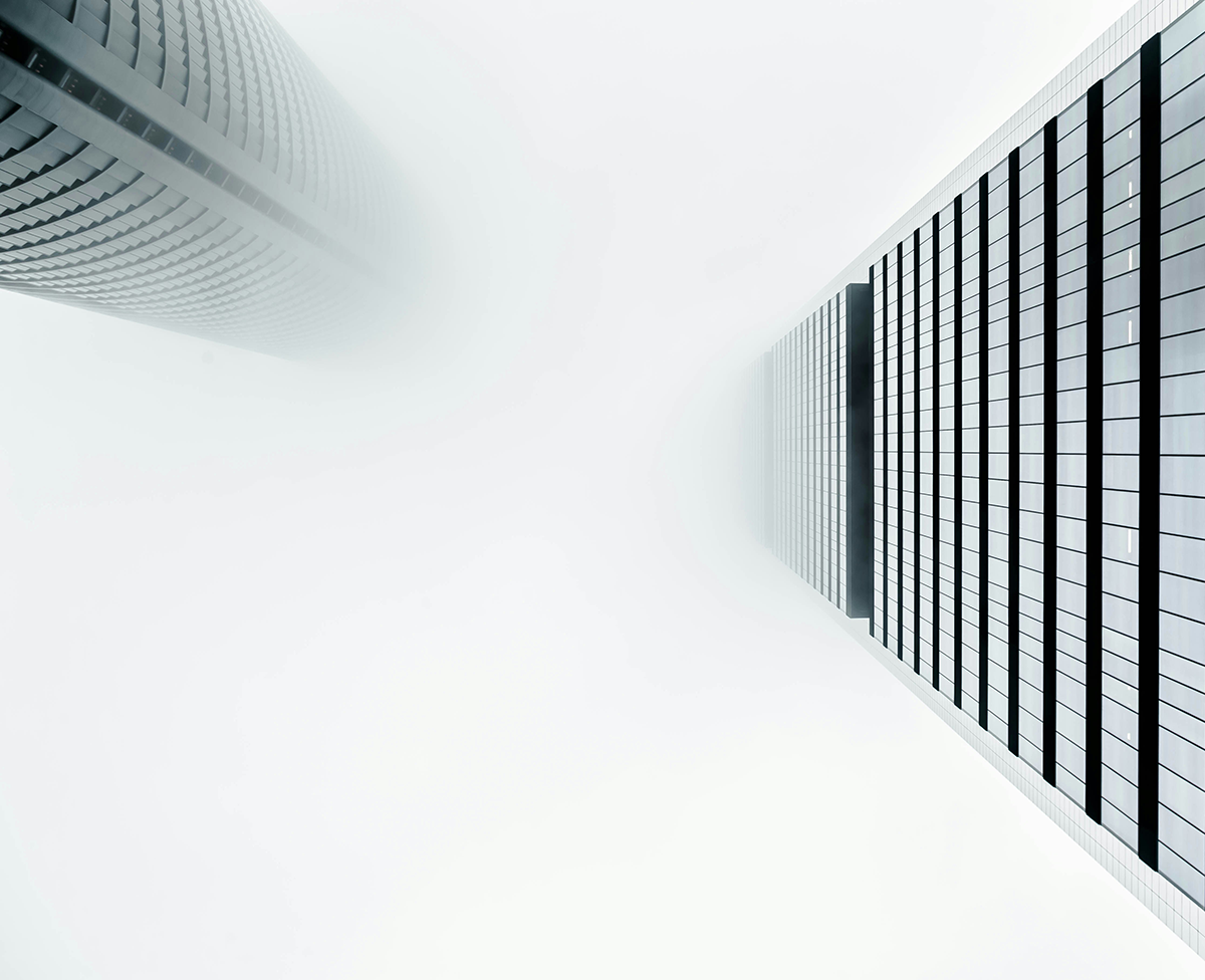 Looking up between two modern skyscrapers